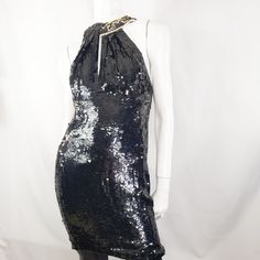 "by AJ Bari Black sequins dress with Pearland wood beading neckline. 15\" across 13\" waist 35\" long Lined Good condition with minor (if any!) missing sequins. Please review all shop policies before completing transaction. All sales final. No returns/exchanges. * Bundle up - we combine shipping. * Instagram @vintagerunsdeepshop" Fitted Sequin Dress For Night Out, Disco Sequin Dress For Evening With Glitter, Embellished Sequin Dress For Costume Party, Disco Style Embellished Sequin Fabric For Evening, Disco Style Embellished Sequin Dress For Night Out, Embellished Sequin Dress For Costume Party And Holiday, Sequin Dress For Cocktail, Fitted Sequin Dress For Costume Party And Holiday, Fitted Sequin Dress For Holiday Costume Party