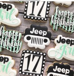 decorated cookies with jeeps and numbers on them for a 21st birthday party or baby's first birthday