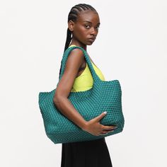 Woman wearing Forest Sol and Selene Sky's The Limit - Large Tote 841764108232 View 1 | Forest Packable Shoulder Bag For On-the-go, Functional Green Tote Bag, Packable Shoulder Bag For Shopping, Packable Tote Shoulder Bag For On-the-go, Functional Packable Shoulder Bag For Shopping, Green Rectangular Packable Shoulder Bag, Versatile Everyday Beach Tote Bag, Green Tote Weekender Bag For On-the-go, Green Everyday Packable Shoulder Bag