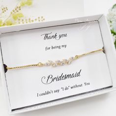 the bridesmaid bracelet is in a box