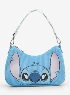 Get ready for your next beach day with this Lilo & Stitch-inspired bag! Featuring a corduroy body  the front of this bag includes an embroidered portrait of Stitch on the front and an embroidered duck and butterfly on the back. With a removable flower shoulder strap and adjustable crossbody strap  this purse is perfect for fans of the Disney film.A BoxLunch Exclusive!PolyurethaneApprox. 8 34" W x 6 14" H x 3 12" DImported Stitch Vanity Mirror, Lilo And Stitch Things, Cute Stitch Things, Stitch Stuff To Buy, Cute Stitch Stuff, Stitch Gift Basket, Stitch Presents, Stitch Keychains, Stitch Room