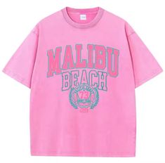 Elevate your casual style with this trendy cotton t-shirt featuring a washed finish and stylish Malibu Beach letter print. Designed for comfort and ease, this loose-fit tee offers a relaxed silhouette perfect for everyday wear. Pair it with your favorite jeans or shorts for a chic, effortless look. Ideal for adding a touch of laid-back fashion to your wardrobe. Available in various sizes for a perfect fit. Casual Summer T-shirt With Lettering, Leisure Graphic Tee With Letter Print, Oversized Pink T-shirt For Beach Season, Pink Oversized T-shirt For Beach Season, Trendy Summer T-shirt With Lettering, Summer Short Sleeve T-shirt With Lettering, Oversized T-shirt For Beach Season Streetwear, Casual Streetwear T-shirt For Beach Season, Pink Summer T-shirt For Streetwear