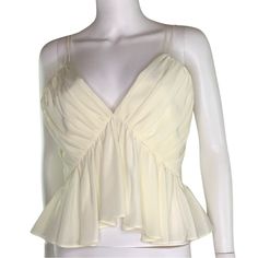 Nwot Lily Silk | Peplum Style Magnolia Silk Camisole Size: 8, Medium (See Photo For Sizing From Www.Lilysilk.Com) Color: Ivory Cream White (Manuf. Color, Lily White) Material: Silk Crpe De Chine Fabric Care: Hand Wash Cold, Line Dry, Cool Iron; Or Dry Clean. Description Add Effortless Femininity To Your Wardrobe With The Versatile Magnolia Camisole. Delicate And Demure Handcrafted Spaghetti Straps And A Plunging Neckline Are Thoughtfully Complemented By Elegant Silk And Playful Ruffles. Pair Wit Fitted V-neck Tank Top With Ruffles, Chic V-neck Ruffled Camisole, Fitted V-neck Camisole With Ruffles, Spring Party Peplum Top With Ruffles, Fitted Peplum Top With Ruffles For Summer, Chic V-neck Peplum Top For Party, Fitted Ruffle Camisole Top, Chic V-neck Peplum Top For Summer, Fitted V-neck Peplum Top With Ruffles