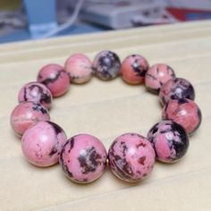 Material:pink rhodonite beads  size :Approx 16mm   quantity: one strand  6mm approx 29 pcs one strands 7mm approx25 pcs one strands 8mm approx 22 pcs one strands 9mm approx 21pcs one strands 10mm approx 19 pcs one strands 11mm approx 18pcs one strands 12mm approx 16 pcs one strands 13mm approx 16 pcs one strands 14mm approx 15 pcs one strands 15mm approx 14pcs one strands 16mm approx 14 pcs one strands 17mm approx 13pcs one strands 18mm approx 13pcs one strands 19mm approx 12pcs one strands 20mm Pink Round Gemstone Beads Jewelry, Pink Round Jewelry With Gemstone Beads, Pink Round Gemstone Beaded Jewelry, Round Pink Jewelry With Gemstone Beads, Pink Gemstone Beaded Bracelets For Jewelry Making, Pink Beaded Jewelry With 8mm Round Beads, Pink Gemstone Beads Jewelry, Pink Round Beaded Jewelry 8mm, Pink Round 8mm Bead Jewelry