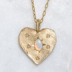 Our Big Heart pendant has been set with a South Australian crystal opal surrounded by stars of G/VS diamonds. Heart measures 20.5 x 19.5mm Elongated trace chain measures 45cm. Please note, we will match the opal as close to the image as possible. Each opal is unique and may vary in appearance and colour from what is depicted on the site. Big Heart Necklace, Crystal Opal, Vs Diamond, Silver Heart Necklace, Opal Crystal, Opal Pendants, Big Heart, Chain Pendants, Heart Necklace