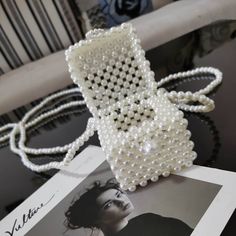 Material: Pearl2 Colors Available: Color1#, Color2#Size (L x W x H): 7CM x 7CM x 8CM / 2.7 x 2.7 x 3.1 '' (Approx) Gender: WomenItem: Women bagClosure: ButtonNumber of Handles / Straps: 1Style: Fashion, Cute Box Bags, Hip Clothes, Aesthetic Spring, Embroidery Bags, Handmade Jewelry Tutorials, Metallic Bag, Beaded Crafts, Beaded Handbag, Beaded Purses