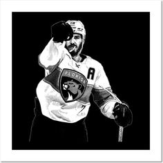 a black and white photo of a hockey player