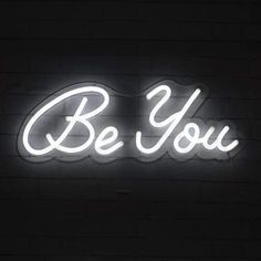 a neon sign that says, be you