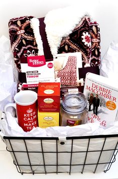 the basket is filled with various items to be used as a gift