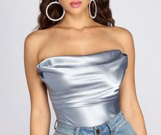 Serve some sultry looks in this on trend corset crop top! It features a sleeveless strapless square neckline with a slight cowl detail. a square back with multiple hook and eye closures. wired side seams. and a cropped hem. The top is composed of a smooth. satin-like fabric with a pretty sheen that offers no stretch and includes a sheer mesh front lining. Satin Corset, Corset Crop Top, Cropped Tops, Woven Top, Square Neckline, Strapless Top, Light Blue, Crop Top, Mesh