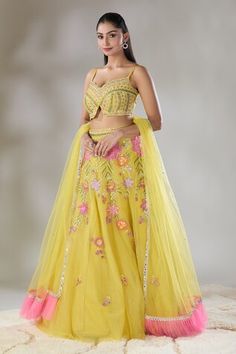 Yellow attached cancan lehenga with handwork sequin, thread, cutdana, mirror embroidery in floral pattern. Paired with embroidered padded blouse and pink ruffle bordered dupatta. - Aza Fashions Yellow Organza Choli With Intricate Embroidery, Sleeveless Embroidered Wedding Lehenga, Fitted Sets With Dori Work In Organza, Fitted Organza Choli With Dori Work, Fitted Organza Sets With Dori Work, Fitted Organza Lehenga With Dori Work, Yellow Organza Choli With Dori Work, Embroidered Organza Sleeveless Lehenga, Sleeveless Embroidered Organza Lehenga