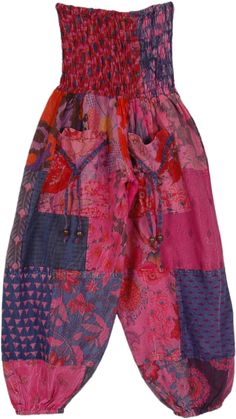 A mixed-print patchwork pants in a vibrant pink tone for the young ones.  These soft cotton hippie pull-on pants have a smocking elastic waist, two functional front pockets, and elastic bottom. #tlb #SplitSkirtsPants #Patchwork #bohemianfashion #Handmade #GirlsHippiePants #CountryPants #KidsPants Pink Cotton Patchwork Bottoms, Pink Cotton Harem Pants With Pockets, Summer Pink Patchwork Pants, Casual Pink Patchwork Bottoms, Pink Cotton Patchwork Pants, Pink Cotton Harem Pants For Spring, Pink Cotton Spring Harem Pants, Spring Pink Cotton Harem Pants, Pink Summer Harem Pants