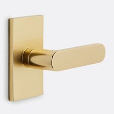 an image of a brass door handle on a white background