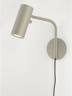 a white wall light with a gray shade on it's side and a black cord attached to the arm