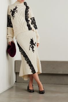 Erdem's sweater is hand-embellished with beaded floral motifs inspired by Victorian wallpaper patterns and borders. Cable-knitted from sumptuous wool-blend in a relaxed shape, it's traced along the front with scalloped lace for an extra touch of romance. Be inspired by the label's Fall '23 runway and wear yours with the matching skirt. Elegant Wool Jacquard Knit Sweater, Chic Embellished Spring Sweater, Elegant Spring Wool Sweater, Chic Embellished Fall Sweater, Elegant Wool Sweater For Spring, Elegant Embroidered Winter Sweater, Long Sleeve Knit Sweater With Lace Trim, Fitted Fall Sweater With Lace Trim, Elegant Embroidered Spring Sweater