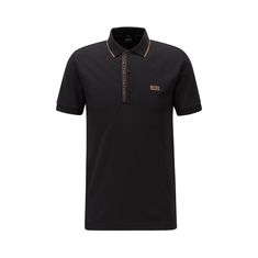 a black polo shirt with gold detailing on the collar