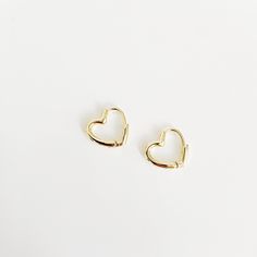 Limited Edition - Heart Hoop Earrings Lightweight and easy to wear, with a snap closure Gold-plated over brass These earrings measure approx. 1/2 inch wide by 1/2 inch long Heart Hoop Earrings, Bride Jewellery, Gift Card Sale, Earrings Collection, Bride Bridal, Bridal Headpieces, Discount Codes, Shop Necklaces, Jewelry Care