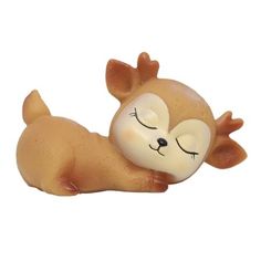 a small toy animal laying on its side with eyes closed and one eye closed, sleeping