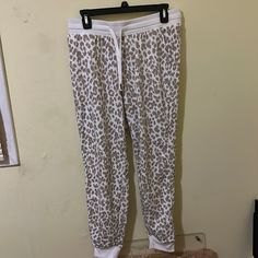 White And Tan Leapord Print Without Tags But Never Worn Like New Condition Has Pockets! Drawstring To Tie And Tighten If Needed Waist Measurement About 15” Inseam About 27” Pj Pants, Waist Measurement, Pants Color, Navy White, Women's Intimates, Navy And White, Old Navy, Pajamas, Like New