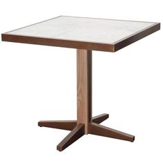 a square table with wooden legs and a white marble top on an isolated white background