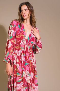 A printed woven maxi dress featuring V neckline, long sleeve with smocked cuff, smocked waist band and ruffled hemline Details: Self : 100% PolyesterLining : 100% Polyester Size & Fit - Model is 5`9" And Wearing Size Small- Measurements Taken From Size Small- Approx. Length: 60" Chic V-neck Maxi Dress With Vibrant Print, V-neck Maxi Dress With Smocked Cuffs, Patterned V-neck Maxi Dress With Vibrant Print, Multicolor V-neck Maxi Dress With Smocked Back, Maternity V-neck Maxi Dress With Floral Print, V Neckline, Waist Band, Smocking, Fitness Models