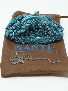 Santi Hand-beaded Blue Jeweled Turquoise Evening Bag. Condition is "New with tags". Shipped with USPS Priority Mail Medium Flat Rate Box. Fancy Purses, Purse Ideas, Arm Candy, Blue Beads, Hand Beading, Priority Mail, Evening Bags, Bags Handbags, Coin Purse