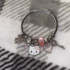 Gorgeous Hello Kitty Bangle Bracelet Charms On Bracelet: Bow, Star , Hello Kitty , Heart And A Key. In Between Each Charm Is A Different Type Of Bead The Bangle Fits To Your Liking As Well. Stretches Open To Your Size :) Brand New Jewelry Hello Kitty, Hello Kitty Heart, Sanrio Jewelry, Open Bangle Bracelet, Locket Bracelet, Bracelet Charms, Open Bangle, Pandora Style, Bangle Bracelets With Charms