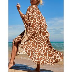 Brown Print Long Kinimo Beachwear Beachy Vacation Cover-up With Relaxed Fit, Beachy Relaxed Fit Cover-up For Vacation, Beachwear Cover-up For Vacation With Relaxed Fit, Casual Brown Beach Cover-up, Casual Beach Cover-up With Relaxed Fit, Relaxed Fit Beach Season Cover-up, Oversized Open Front Cover-up For Vacation, Casual Open Front Beach Cover-up, Casual Oversized Cover-up For Vacation