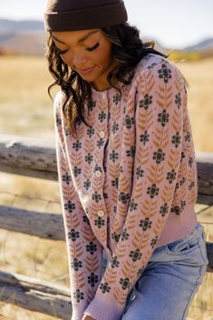 The Meadow Floral Cardigan is one you want in your closet. Featuring floral material, functional buttons, and thick material, this pretty pink cardi will bring some joy to those gloomy winter days! // paired with the on my own tie waist pants Winter Floral Print Pink Outerwear, Winter Pink Floral Print Outerwear, Winter Pink Outerwear With Floral Print, Pink Casual Cardigan For Cold Weather, Casual Pink Cardigan For Cold Weather, Cozy Pink Cardigan For Cold Weather, Pink Floral Print Outerwear For Fall, Pink Button-up Sweater For Fall, Cozy Pink Button-up Outerwear