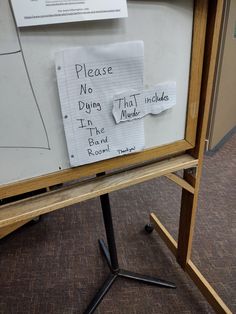 a bulletin board with notes attached to it