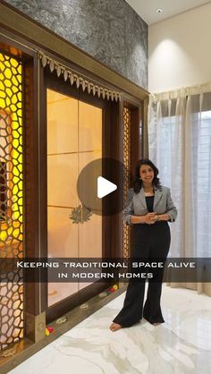 a woman standing in front of a glass window with the words keeping traditional space alive in modern homes