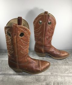 "Up on ETSY for buy it now is a pair of good condition, Vintage Acme Dingo Punchy Buckaroo Cowboy Western Leather Mens Boots. Made in USA. Size 10.5 D, Medium US. Leather uppers. Rubber soles and rubber heels. From smoke-free home. Clean inside and out. Very well built and sturdy. Approximate Outside Dimensions: 12.5 inches heel to toe by 4.25 inches across the ball of footwear by 2.25 inches tall heels by 14.5 inches tall. Sold as is gently used.  Please check out the pictures. If you need more Tall Heels, Mens Cowboy, Western Leather, Cowboy Western, Mens Shoes Boots, Western Cowboy Boots, 5 Inch Heels, Rubber Heels, Western Cowboy