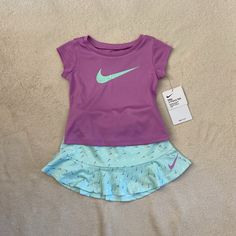 Nike Baby Girls Outfit Size 18 Months. Short Sleeve Shirt And Skort. Purple Shirt And Green Skort. Brand New! Nike Baby Girl Outfits, Nike Sweat Suit, Nike Sweatsuit, Nike Set, Black Nike Shorts, Nike Tracksuit, Baby Nike, Red Camo, Nike Sweats