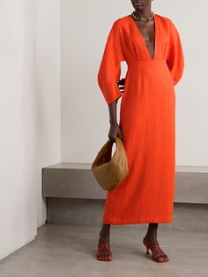 Mara Hoffman believes in using natural fibers in its garments - this 'Irina' maxi dress is cut from breathable hemp that requires relatively little water to grow and harvest. In a vibrant 'Poppy' shade, it has a plunging neckline that draws the eye to the nipped-in waist and is complete with billowy dropped sleeves. Mara Hoffman Dress, Orange Maxi Dress, Designer Maxi Dress, Mara Hoffman, Matthew Williamson, Cotton Maxi, Knitwear Tops, Designer Gowns, Maxi Dress Blue