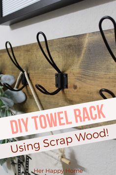 diy towel rack using scrap wood with text overlay that reads, diy towel rack using scrap wood