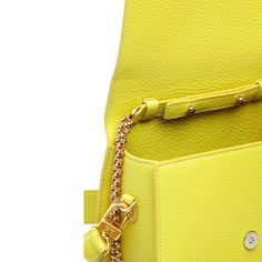 The Wave Saddle Bag – This is the perfect day to evening bag with its 2 detachable straps a short leather shoulder strap and a mini crossbody chain strap. This bag embodies durability and timeless design, making it an essential addition to your wardrobe.  *The yellow-green Chartreuse bag comes in a small grained pebble leather.   Light gold-toned custom hardware Microsuede Lining Cow Leather Exterior Interior: 1 open pocket Comes with 2 Shoulder Straps: Leather Shoulder Strap 20. 5" attached by Everyday Luxury Crossbody Flap Bag With Top Carry Handle, Chic Everyday Luxury Flap Bag With Top Carry Handle, Travel Flap Bag With Chain Strap And Top Handle, Travel Top Handle Flap Bag With Chain Strap, Chic Everyday Luxury Satchel With Detachable Strap, Designer Travel Satchel With Chain Strap, Elegant Yellow Crossbody Flap Bag, Elegant Yellow Leather Flap Bag, Evening Yellow Flap Bag With Detachable Strap