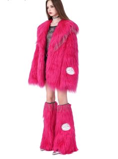 Luxurious oversized faux fur coat in eye-catching hot pink. Features a plush, shaggy texture and wide lapels for a glamorous look. The coat has a relaxed fit and appears to fall just above the knee. Perfect for making a bold statement at events, parties, or for those who love to incorporate vibrant colors into their winter wardrobe. Model info Height: 173cm Weight: 46kg Wearing size: M Pink Winter Outerwear With Feather Trim, Pink Faux Fur Outerwear With Fur Trim, Winter Pink Fluffy Fur Coat, Trendy Pink Faux Fur Coat, Pink Faux Fur Coat For Winter, Pink Faux Fur Trim Coat For Spring, Fall Pink Outerwear With Feather Trim, Pink Feather Trim Outerwear For Fall, Pink Fur Coat With Faux Fur Lining For Winter