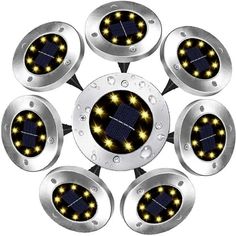 eight solar powered lights are arranged in the shape of a circle with stars on them