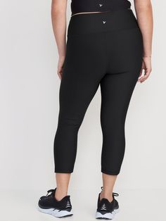 elasticized waist breathable go-dry wicks moisture sits at belly button fitted hits mid-calf 21" inseam models are approx.  5'9" and wear sizes s (4), l (12), and xl (18)machine wash according to the care instruction label Black Compression Pants With 5-inch Inseam, Versatile Black Bottoms For Pilates, Compressive Black Bottoms With Elastic Waistband, Black Mid-rise Bottoms For Pilates, 4-way Stretch Black Bottoms For Pilates, Black 4-way Stretch Bottoms For Pilates, Casual Black Bottoms For Pilates, Black High Stretch Yoga Pants With Comfort Waistband, Black Mid-rise 4-way Stretch Yoga Pants