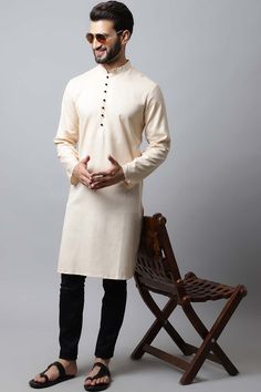 Pure Cotton Kurta with Side Placket Product Features: Color: Light Cream Fabric: Pure Cotton Work: Solid Style Type: Regular Kurtas Sleeve Type: Full Sleeve Length: Long Kurta Collar Type: Mandarin Size Fit: Regular Fit Package Details: 1 Long Kurta Occasion: Festive Material Care Description: Machine wash Disclaimer: There will be slight difference in digital to actual image Casual Cotton Kurta For Winter, Casual Long Sleeve Beige Kurta, Casual Beige Long Sleeve Kurta, Beige Long Sleeve Casual Kurta, Off White Fitted Long Sleeve Kurta, Fitted Long Sleeve Off White Kurta, Off White Long Sleeve Cotton Kurta, Cream Fitted Long Sleeve Kurta, Long Kurta