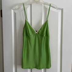 Theory Green Silk Spaghetti Strap Camisole Top. Gorgeous, Bright Green Color W/Cream Lace Trim. Color: Green (Designer Color: Grass) 51% Viscose / 49% Acetate Size: Small Condition: New With Tags. One Small Mark On Inside Of Blouse That Is Not Visible When Wearing. Please See Photos. Comes From A Non-Smoking, Pet-Free Home. Green Tops With Built-in Bra For Spring, Green Scoop Neck Top With Built-in Bra, Spring V-neck Camisole With Adjustable Straps, Spring Camisole With Built-in Bra And Spaghetti Straps, Spring Tank Camisole With Built-in Bra, Green Cotton Camisole With Tank Straps, Spring V-neck Tank Top With Straps, Green Cotton Tank Camisole, Fitted Summer Tank Camisole