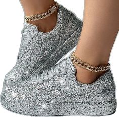 Trendy Silver Bling Sneakers, Trendy Silver Sneakers With Bling, Glamorous Rhinestone Sneakers With Round Toe, Silver Lace-up Party Sneakers, Party Lace-up Synthetic Sneakers, Trendy Party Sneakers With Synthetic Material, Glamorous Bling Sneakers With Round Toe, Glamorous Sneakers With Bling And Round Toe, Spring Bling Sneakers With Round Toe