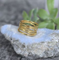 "Gold Spiral Ring -.18k gold plated over sterling silver - 10mm width/height -Versatile and Comfortable, works great as a thumb ring! - Available in US sizes 5-12 Find all rings here: https://www.etsy.com/shop/AWildViolet?section_id=13958646&ref=shopsection_leftnav_3 💜Check out our new \"Ready to Ship\" section for gifts that ship in 1 business day. https://www.etsy.com/shop/AWildViolet?ref=seller-platform-mcnav§ion_id=23587515 Connect with us on Instagram @a_wild_violet for sales and giveaways Gold Spiral Minimalist Stackable Rings, Elegant Gold Spiral Stackable Rings, Modern Twist Spiral Stackable Rings As Gift, 14k Gold Spiral Rings, Modern Twist Gold Stackable Rings As Gift, Gold Stackable Rings As Gift With Modern Twist, Gold Bypass Ring With Modern Twist For Gift, Modern Twist Gold Bypass Ring As Gift, Gold Spiral Stackable Rings