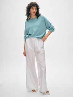 If you loved our Cashmere Drop Shoulder Sweater, it’s time you met our warm-weather version in a cotton blend. A must-have on off-duty days, this style boasts all the markers of refined ease: drop shoulders, a cropped and boxy fit, and wide sleeve. Wear it tucked or untucked with your favorite pair of jeans. Details Relaxed fit. Long sleeve. Length in size small is 21". The model is 5'10 1/2" and is wearing a size small. 44% Cotton, 36% Linen, & 20% Recycled Polyester. Hand wash cold or dry clea Riviera Chic, Jeans Details, Cashmere Travel Wrap, Drop Shoulder Sweater, Drop Shoulder Sweaters, Cardigan Top, Sweater Sale, Knitwear Cardigan, Wide Sleeves