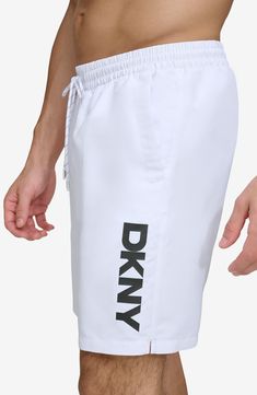 Hit the boardwalk or go for a swim in these volley swim trunks built from quick-drying fabric with UPF 40+ sun protection. 7" inseam (size Medium) Elastic/drawstring waist 100% REPREVE® recycled polyester REPREVE recycled polyester is made from 100% post-consumer recycled plastic bottles Machine wash, line dry Imported White Beachwear Swimwear For Outdoor, White Summer Swimwear For Outdoor, White Shorts For Beach Season Outdoor Activities, White Beach Season Shorts For Outdoor, White Shorts For Outdoor Beach Season, White Summer Outdoor Swimwear, White Beach Season Outdoor Shorts, White Swim Trunks For Beachwear, White Swim Trunks For Outdoor Beachwear