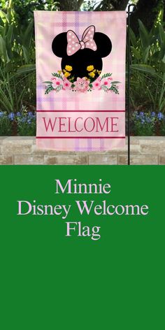 a welcome sign with minnie mouse on it