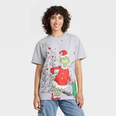 New Women's The Grinch Oversized Graphic Short Sleeve T-Shirt - Heathered Gray Medium Get Into The Christmas Spirit With This Adorable Grinch Shirt From Target. The Shirt Features A Cute Design Of Max And The Grinch, Perfect For The Holiday Season. Made With Lightweight Cotton Material, This Relaxed Fit T-Shirt Has Short Sleeves And A Round Neckline. The Shirt Is Available In Size 1x, Perfect For Plus Size Women. Whether You're Wearing It To A Festive Event Or Just Spreading Holiday Cheer, This Grinch Graphic, Grinch T Shirt, The Grinch, Hem Style, Laid Back Style, Graphic Tee Shirts, Pink Tops, Grinch, Christmas Outfit