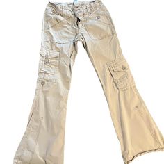 Tan cargo pants with belt, low rise, flared leg #y2kfashion #grungevibes #tan #garage #pants Garage Pants, Cargo Pants, Low Rise, Garage, Pants, Trousers