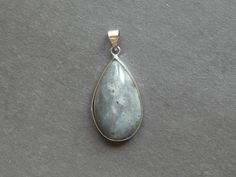 This listing is for a Natural Labradorite Pendant with Platinum Plated Brass Frame and Iron Snap on Bails.  You will receive the exact pendant from the one pictured above in this listing.  The large pendant features a unique coloration and is perfect for adding an eye-catching look to your jewelry. Type- Gemstone Pendant Material- Natural Labradorite Shape- Teardrop Size- 39x21mm Hole Size- 3.8x6.5mm Color- Blue, Green, Golden, Gray -BEADOLOGY BY HEATHER SAVINGS PROGRAM- -No Matter How Much You Silver Teardrop Gemstones, Silver Labradorite Teardrop Pendant Jewelry, Unique Labradorite Teardrop Pendant Jewelry, Iridescent Labradorite Pendant Jewelry, Labradorite Cabochon Oval Pendant Jewelry, Labradorite Cabochon Oval Pendant, Labradorite Pendant, Special Jewelry, Brass Frame