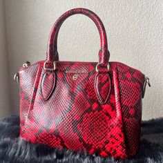 Very Good Condition. No Stains, No Defects. Designer Red Satchel With Double Handle, Designer Red Tote Satchel, Luxury Red Satchel With Handles, Red Top Handle Bag With Handles, Designer Red Satchel With Handles, Red Top Handle Satchel For Errands, Red Satchel With Handle Drop, Michael Kors Bag, Emboss